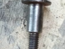 Same bolt cleaned up with rotary brush. Note threads are now clear of debris. 