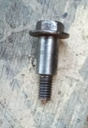 Same bolt cleaned up with rotary brush. Note threads are now clear of debris. 