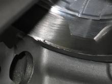 THIS BLEMISH IS RIGHT AT THE BOTTOM OF ONE OF THE CYLINDERS .
