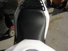 mono seat with integrated cargo rack
