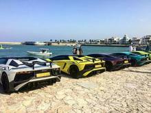 What a delightful sight! Colorful row of supercars parked together in Oman today. These Arab owners have great taste in their Lamborghini whips.