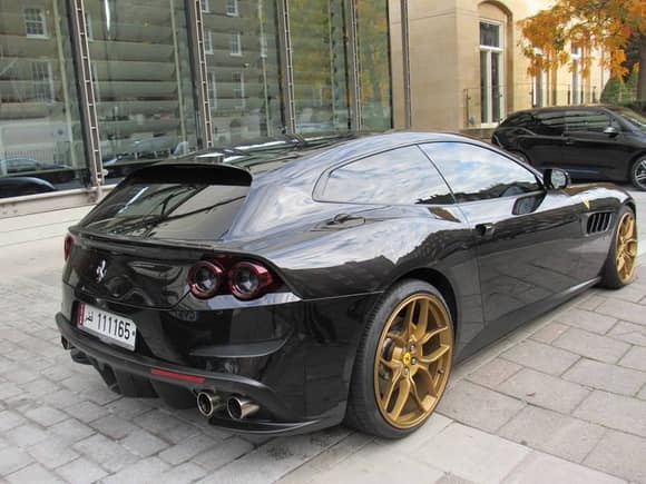 This Qatar owned Ferrari GT4Lusso looks awesome in black with golden wheels. It's quite the best looking spec of a supercar ever spotted.
