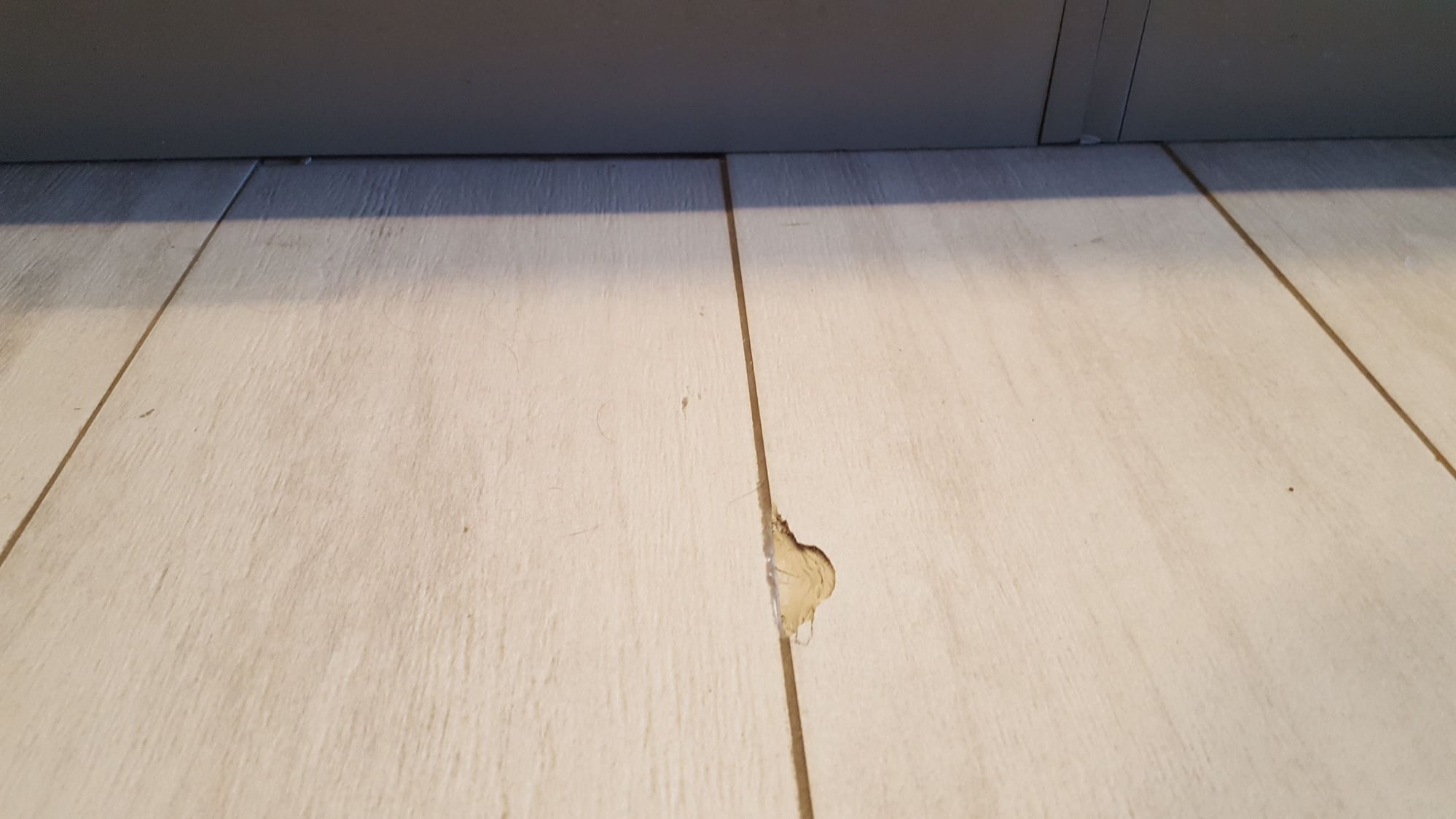 Chip in ceramic plank tile - The Hull Truth - Boating and Fishing Forum