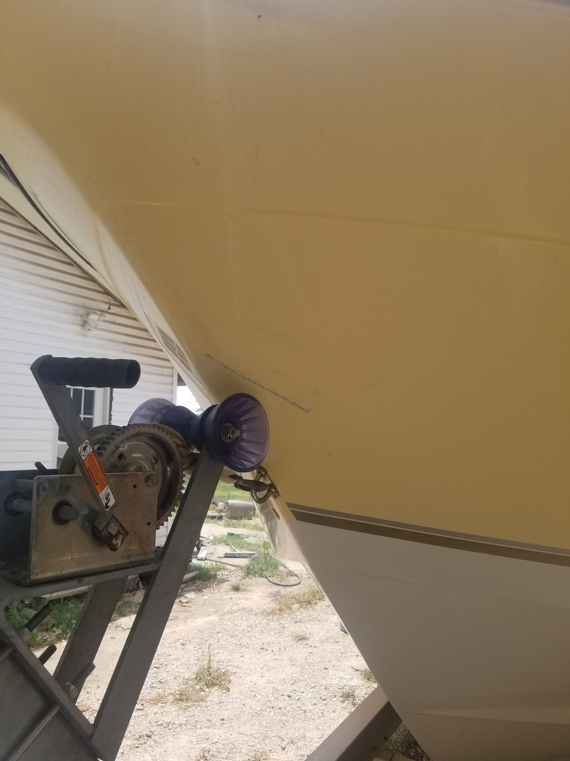How to fix A little scratch from the trailer on a windy 