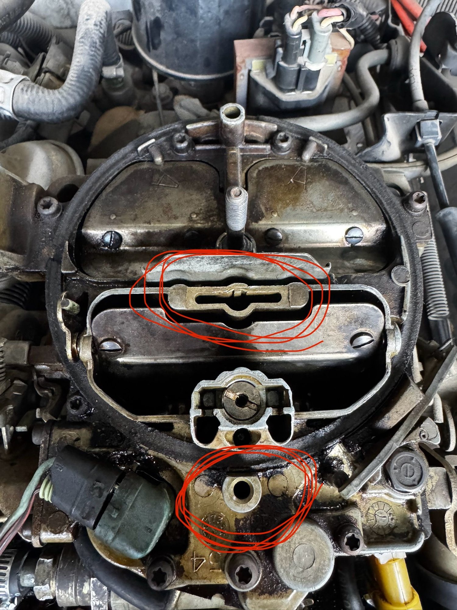 Leaking fuel out of these openings while turning over. 