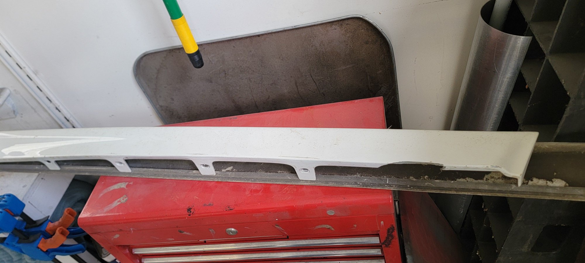 Broken mounting tab.