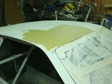 First coat of bondo passenger side. It looks like a lot but its fairly thin.