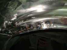 This whole area was up and in by a good bit plus no wheel opening body line.