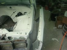 Driver side fender mounting clips installed.