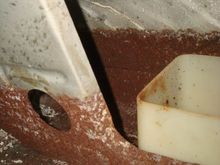 Left of baffle.