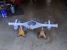 The Quick Performance fabricated housing with BMR weld on sway brackets installed and a coat of primer.