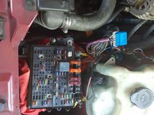For now just running the facotry truck fusebox underneath the hood. Truck harness is still pretty much uncut.