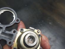 The four T15 bolts to remove the regulator housing.  I have also started to drill out the weld that GM put on at the factory.
