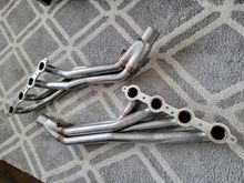 Hawks Satinless Works headers. 
1-3/4" primaries and 2.5" collec