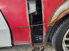 The front fenders were the big challenge, as they have had the wheel opening moved forward 5" and flared out 2". Lots of weld seems to blend in. Also notice the large, uneven gap between door and fender.