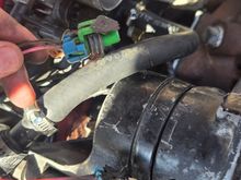 I have these 2 wires that have just been hanging here for years, the car has been sitting for a long time and it runs super rich, im wondering if these have anything to do with the issues i am havung with the car, can any one here identify these? Thank you