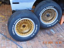 I also tried out my new paint gun, and sprayed one of the stock wheels, left, compared to the old faded one on the right.  
