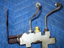 Here is an example of the 5-port I have now. Two on the top run to the MC, the third and the two on the bottom run to the calipers. 