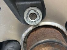 I’m literally begging at this point for someone to have this wheel lock key. I will buy it. I need it to desperately get these wheels off. The previous owner never cared to know where he put it. Apparently he put it in the car everytime he was done with it but I’ve looked literally all over the car. Nothing. And he replaced the caliper on the driver side so he has taken the wheels off before with said key. But I have looked online. Nothing. I desperately need help. 