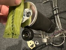 Black rubber piece on return line ?