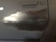 your typical gas pump dents on the driver side door, again not too bad