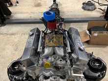 Just added the valve cover caps and that should do it for the motor, now just needs to go in and get tank, overflow tank, remote filter and air separator, cooler  and lines installed.