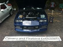 Steelton PA car show showing the banner for our club and the 2nd place trophy from the Middletown PA car show.