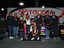 Some of the team and family in the winners circle.