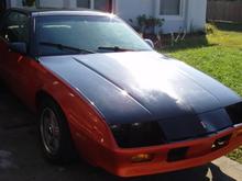 My hood's clearcoat destroyed while covered with a water resistant canvas tarp during engine swap.  The hot FL summer heat caused the plastic coating to melt onto the hood.  Needs to be sanded and repainted.