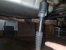 I've circled the bold it's attached to, there's another bolt in the top left corner of the picture that I suppose it cou