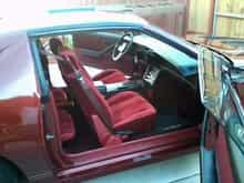 Went with Car and Truck upholstery company and found seat covers, door panels and the T-Top liner in Maroon Brick