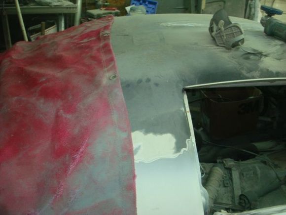 Putting my welding blanket over the back glass so it doesnt get hit by sparks and debris.