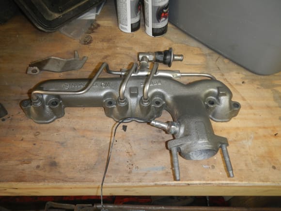 Driver side manifold. It has been surfaced as well.