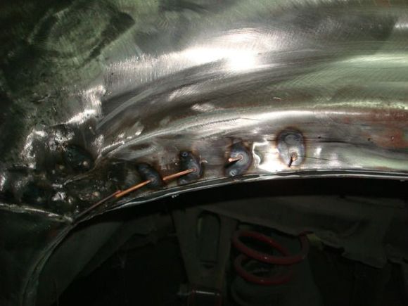 This whole area was up and in by a good bit plus no wheel opening body line.