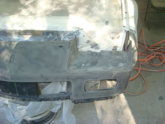 The light brackets mount off the bumper reinforcement. The hole is there but the lights were gone as later 88 they went to a brake cooling duct.