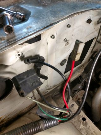 Flat connector and red wire.