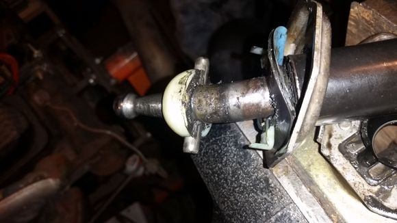 It's hard to tell but the shift lever bends right where the pin goes through it