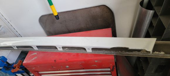 Broken mounting tab.