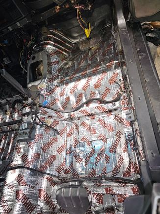 Passenger side after the sound deadening install. Sneak peak at the Manual transmission tunnel cutout. 