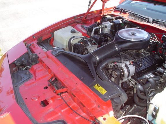 It's the filter case that's of interest in this picture. Rather than the Firebird specific "scoop",  that 4" tube that transitions to the now empty filter would be fed from the TPI Camaro version of the twin filter inlet. 