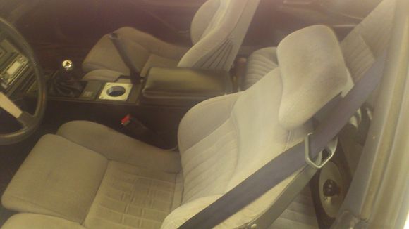 installed the near mint gta grey seats,yes thats a camaro console with a cup holder i added.ive also got a couple firebird consoles but they are separating and it angers me.
