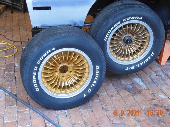 I also tried out my new paint gun, and sprayed one of the stock wheels, left, compared to the old faded one on the right.  