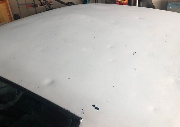 More dramatic view (You can also see my window corner crack, and of course PO's peeling primer.)