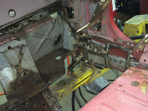 Cut the floor out and restore the rot in the rocker