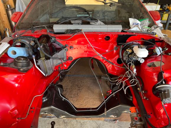 HVAC box reinstalled on the firewall. I also reloomed the wiring harnesses in the engine bay. 