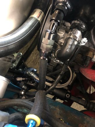 SS high pressure line from pump to box, then Earl's Ultrapro for the cooling lines and return. It cleaned up the engine bay so much.  Will be happy when I do the LS7 swap to run a consistent looking line for PS, fuel, PCV and oil.