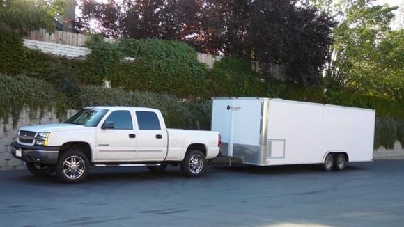 My new 24' Millenium trailer. Craftsman toolbox encased with wrap around work bench, vise and generator. Enough room for ATV &amp; Firebird.