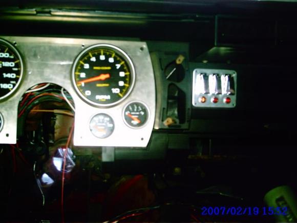 A pic from when I was putting the interior together. My home made gauge setup and switches.