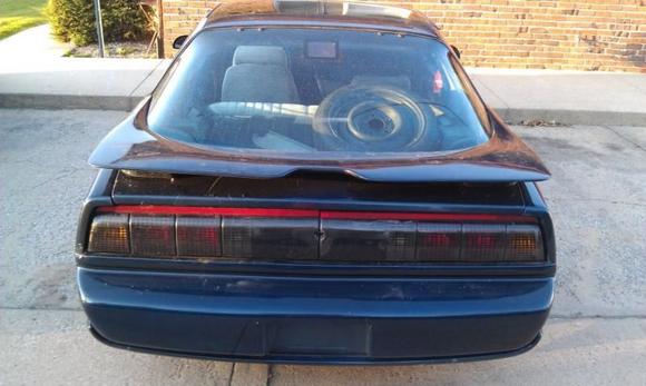 Got the original spoiler and tail lights from the kid I bought it from, he was hard up for cash and I got him to sell them to me cheap.