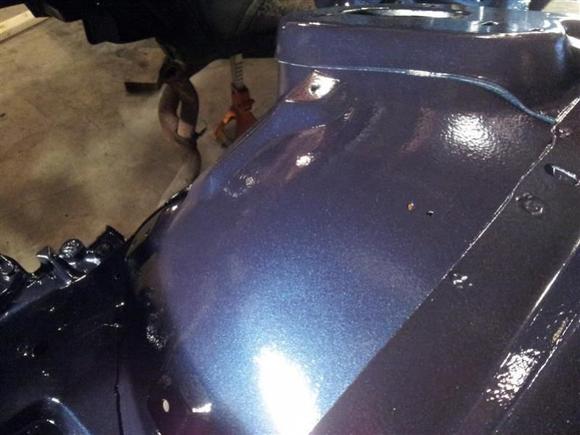 Painted! GM Imperial Metallic Blue. They use this color on 5th gen Camaros. I have never painted before...so go easy on me, I know it isn't perfect.